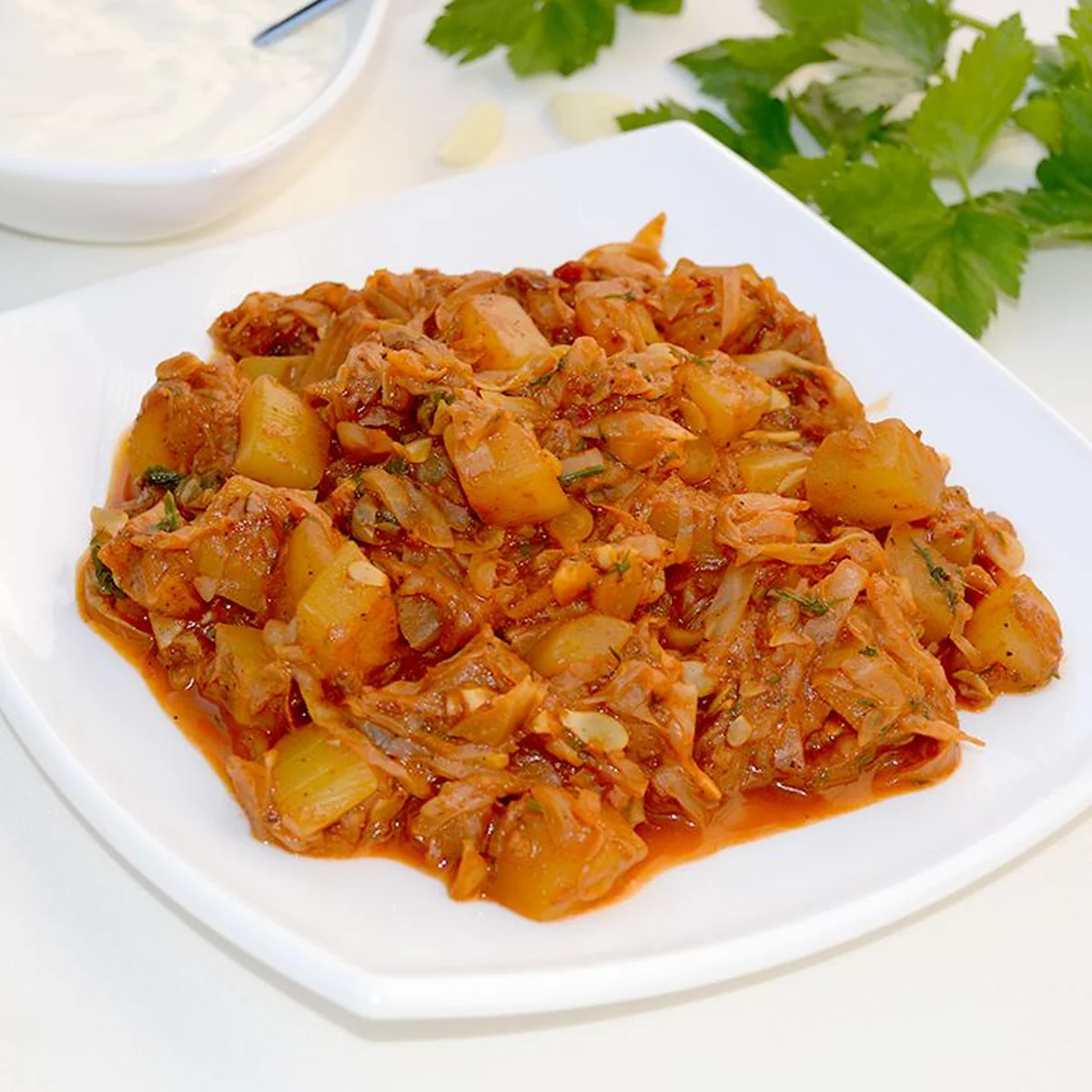 Постная тушёная капуста с кабачками